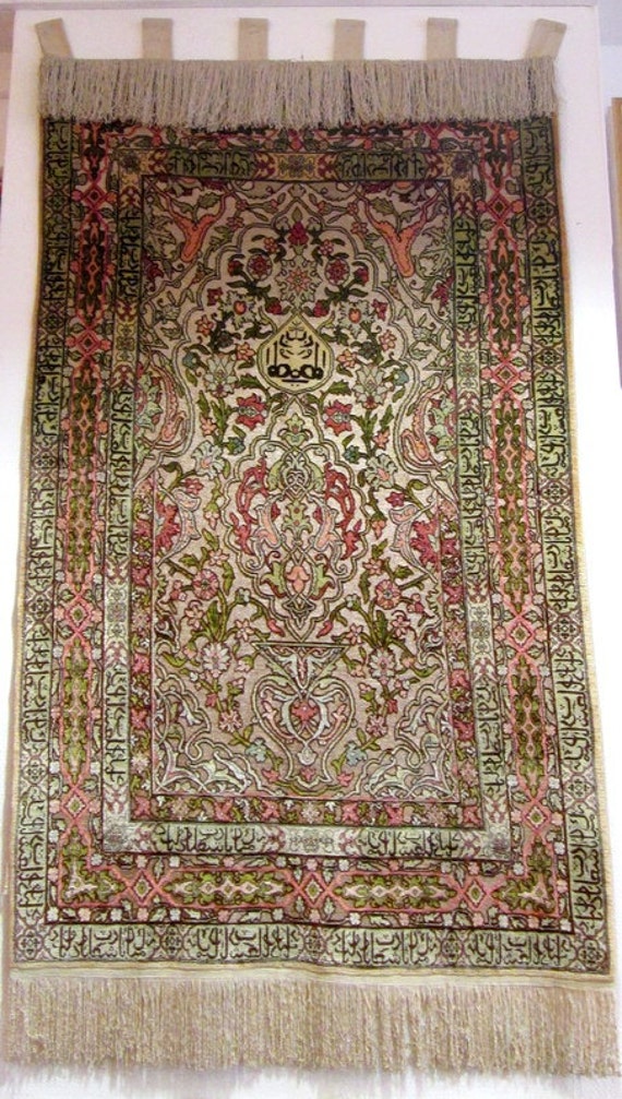 Tapis hereke soie fil d or Tapis hereke soie fil d or