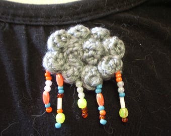 crocheted gray and rainy cloud brooch