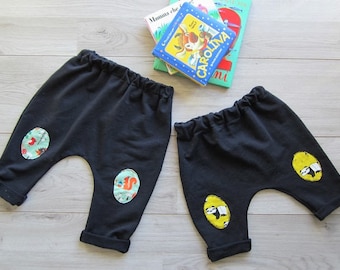 Fleece trousers for children with fancy patches in Jersey