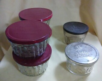 Vintage 1950's Kerr and Ball glass jelly jars with metal lids. 4 Kerr and 2 Ball. Great collectors item. Great condition.