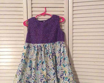 Summer dress in purple, green and turquoise
