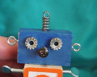 Mini Bot, letter "O", mixed media robot sculpture