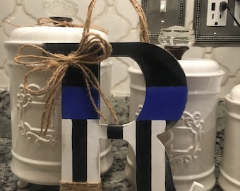 Initial thin blue line