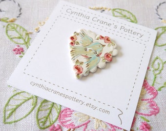 Large Ceramic Porcelain Heart Button with Scalloped Edge, Painted Blue Bird with Red and Pink Flowers