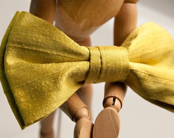 Bright yellow taffeta bow tie, with brooch or collar, suitable for parties
