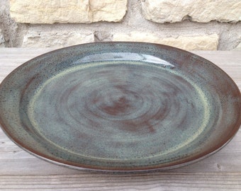 Pottery Dinner Plate on dark clay
