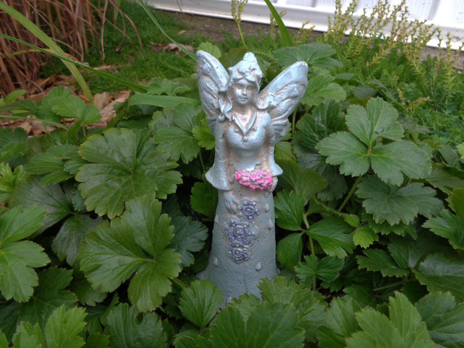 concrete fairy statue