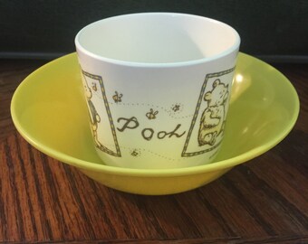 A Texas Ware/MelamineYellow Bowl, and a Selandia/Melamine Pooh Cup!