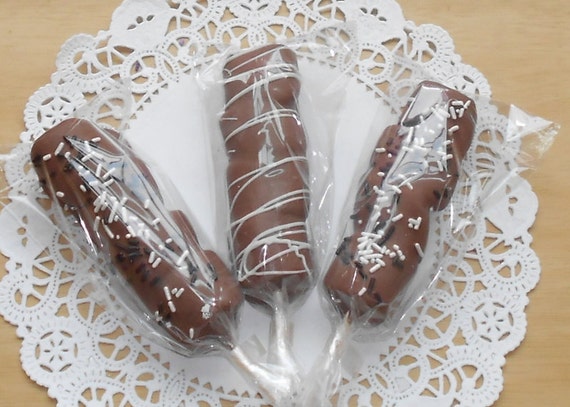 Chocolate covered marshmallows on a stick