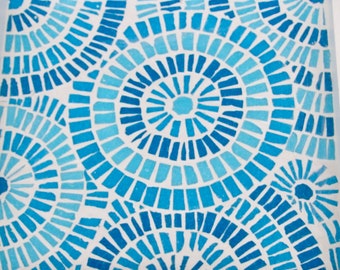 White serving tray with blue circels mosaic