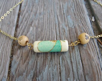 Gold multi-cultural necklace
