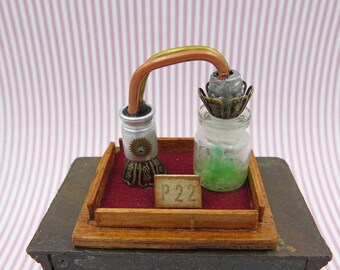 Steampunk circuit to synthesize crystals inside a case in 1:12 scale