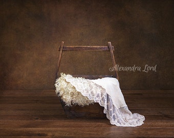 old bucket with wool and lace
