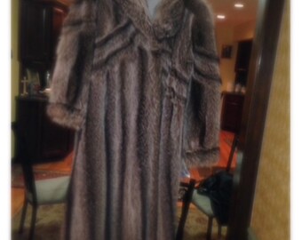 Offers end of season closeout Fur raccoon full length sweet design.not your mothers raccoon coat!! Cold storage every season keeps this coat