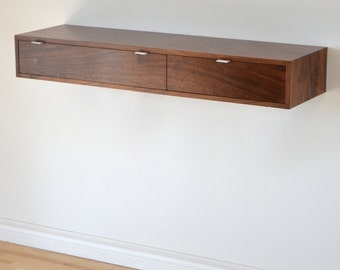 Floating hall table in Walnut