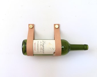 Wine Straps leather and brass wall mount wine holder and magazine rack