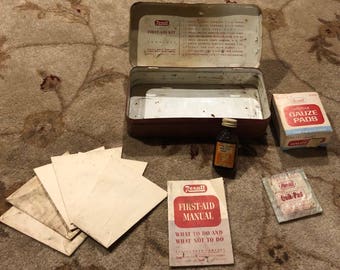 vintage Rexall drug first aid kit tin with supplies (W504)
