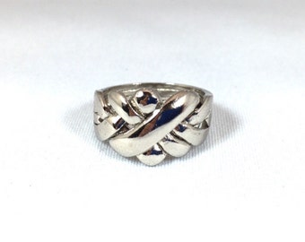 Puzzle Ring Large, the Original Friendship ring in sterling silver.