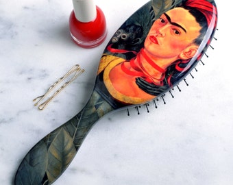 Frida Kahlo Hair Brush."Selfportrait with Monkey" by Frida Kahlo beautifully reproduced on our nylon and boar bristle brush.