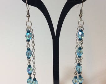 Earrings "Turquoise faceted pearls chained"