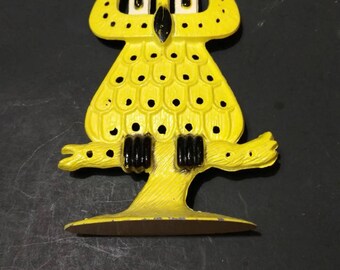 Vintage Revere owl earring holder.