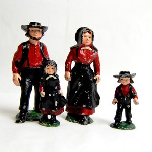 vintage primitive cast iron amish figurines, amish collectibles, amish dolls, antique amish dolls