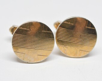 Gold tone cuff links