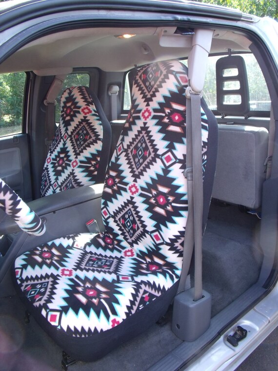 A Set Of Shadow Diamond Multi Seat Covers And Steering Wheel