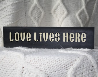 Love Lives Here 10 x 2 1/2 Wood Sign