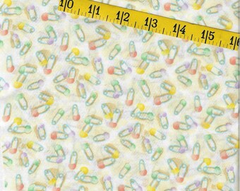 Vintage, cotton fabric, cute baby print covered with diaper pins. 4 yards and 3/4