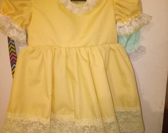 very pretty yellow rebrn doll dress