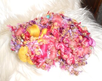"Makes" "Merino, silk, mohair handspun yarn