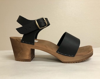 Wide strap sandal on Medium heel in Black oiled with Buckled ankle strap