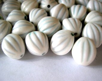 10 VINTAGE beads, lucite white oval with light blue stripes 12mmx10mm