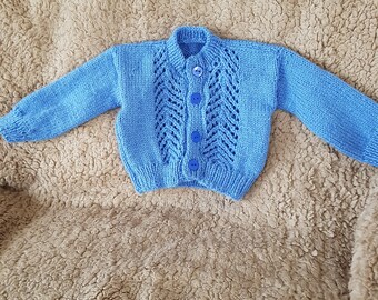 Baby boy's hand knitted cardigan