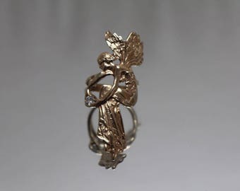 14k - .20 CT - Hand Made Resting Angel Holding a Diamond Full Finger Ring in Yellow Gold