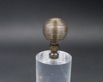 Custom Lamp FinialFeaturing a Horizontally Ribbed Bronze Sphere