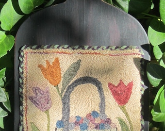 Punch Needle Finished Piece Blueberry Wishes - Mounted on a cutting board.
