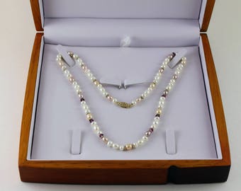 Freshwater pearls necklace with a 14k gold clasp.