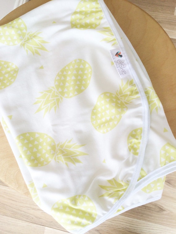 Yellow pineapples baby wrap. Baby swaddle. Girl. Tropical