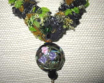 ON SALE: Handknit designer yarn necklace with lampwork focal bead and Swarovski crystal accents
