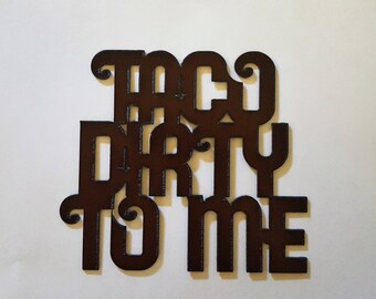 Taco Dirty to Me rusted metal sign