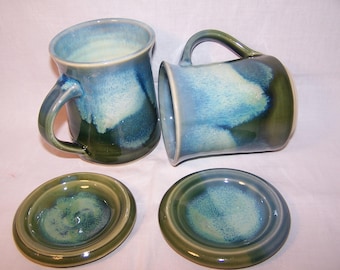 Stoneware Mug with lid. Height Approx. 11 cm.Capacity 400 mls. Three Greens Glaze range.