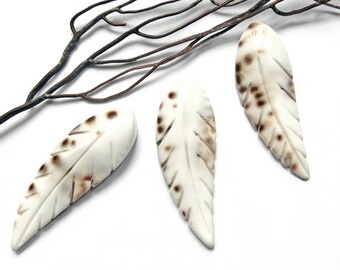 Large pendant carved shell feather or leaf