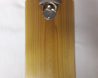 Wall mounted bottle opener with magnetic cap catcher