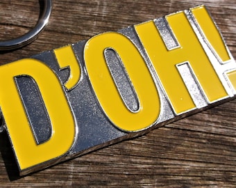D'OH metal keychain - 7 x 3 cm