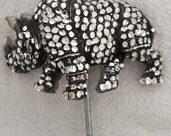 Rhinoceros pony tail cover
