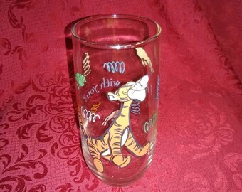 Vintage Tigger glass. Came from McDonald's. Clear glass. Orange and black.