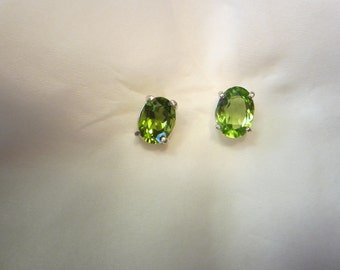 Beautiful Pair of Oval Peridot Stud earrings.