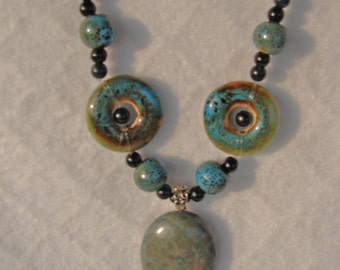Ceramic and obsidian necklace